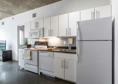 The Hub on Chestnut apartment interior kitchen with white appliances